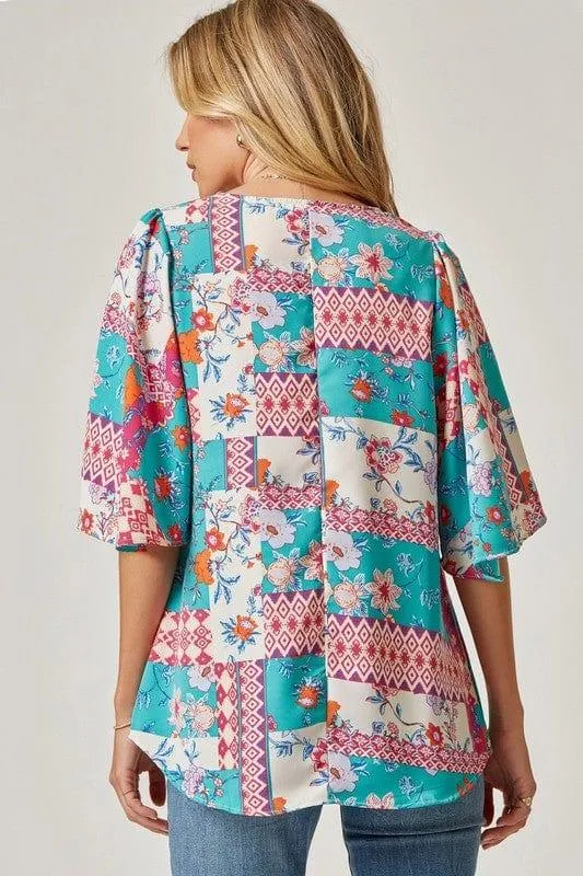 Island Getaway- print flutter sleeve top